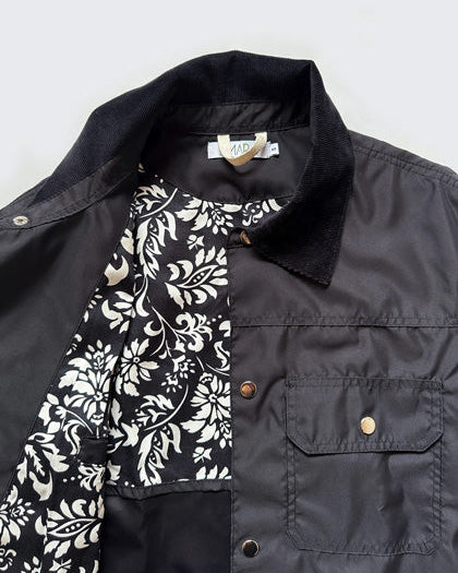 detalle chaqueta chocontá negra